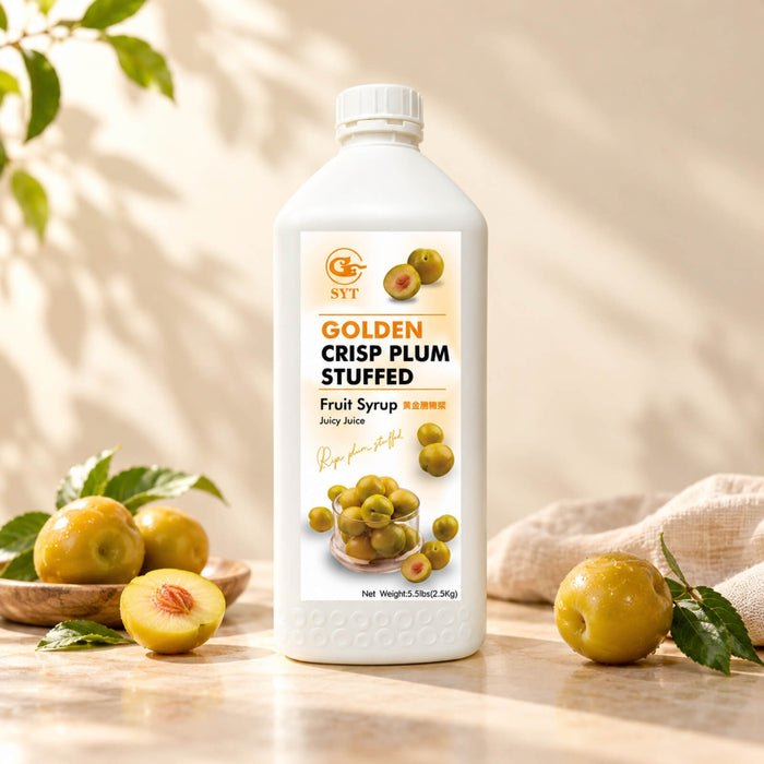 2.5kg white bottle of Golden Crispy Plum Syrup with an orange fruit label, displayed alongside whole and halved golden plums.