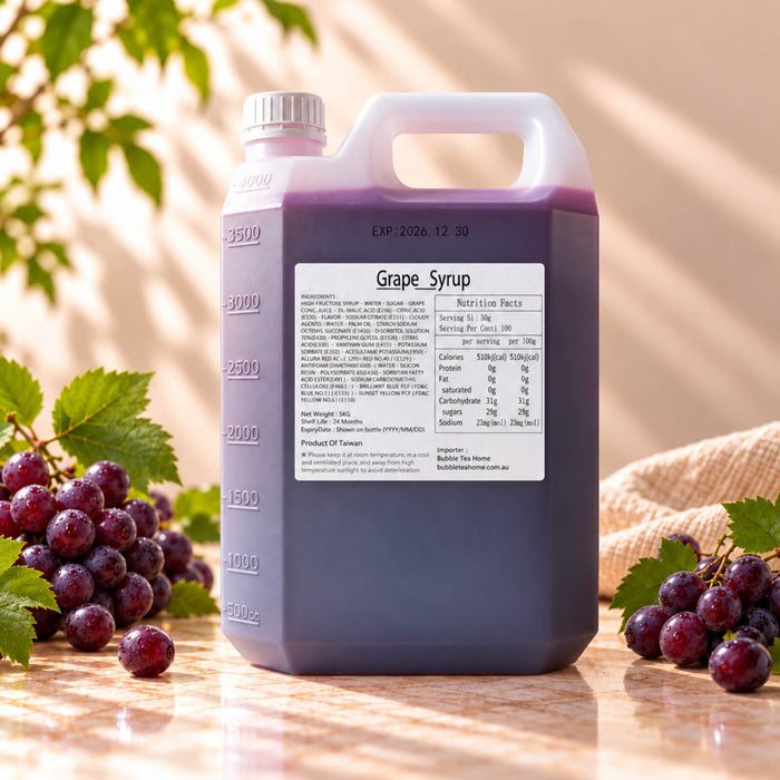 5kg container of Grape Flavoured Syrup with deep purple syrup, displayed alongside bunches of red grapes.