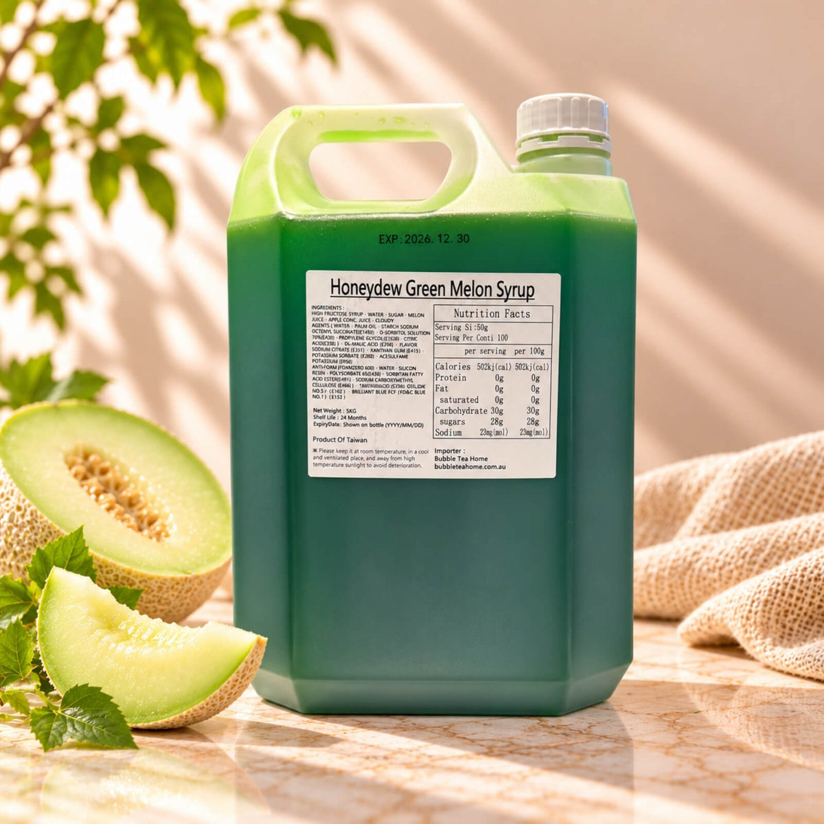 5kg container of Honeydew Flavoured Syrup with dark green syrup, a white screw cap and product label, displayed alongside fresh honeydew melon slices.