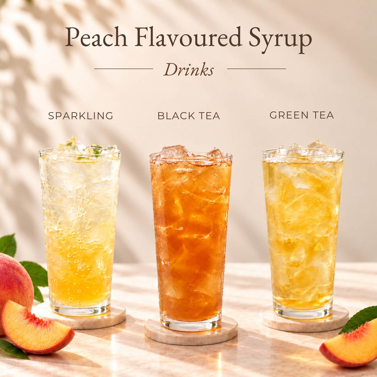 Three iced drinks made with peach flavoured syrup, including sparkling, black tea and green tea.