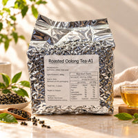 600g package of Roasted Oolong Tea in a silver foil bag with a product label, displayed alongside rolled oolong tea leaves and a cup of golden brewed tea.