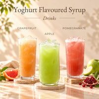 Three iced drinks made with Yoghurt Flavoured Syrup, featuring grapefruit, apple and pomegranate flavours.